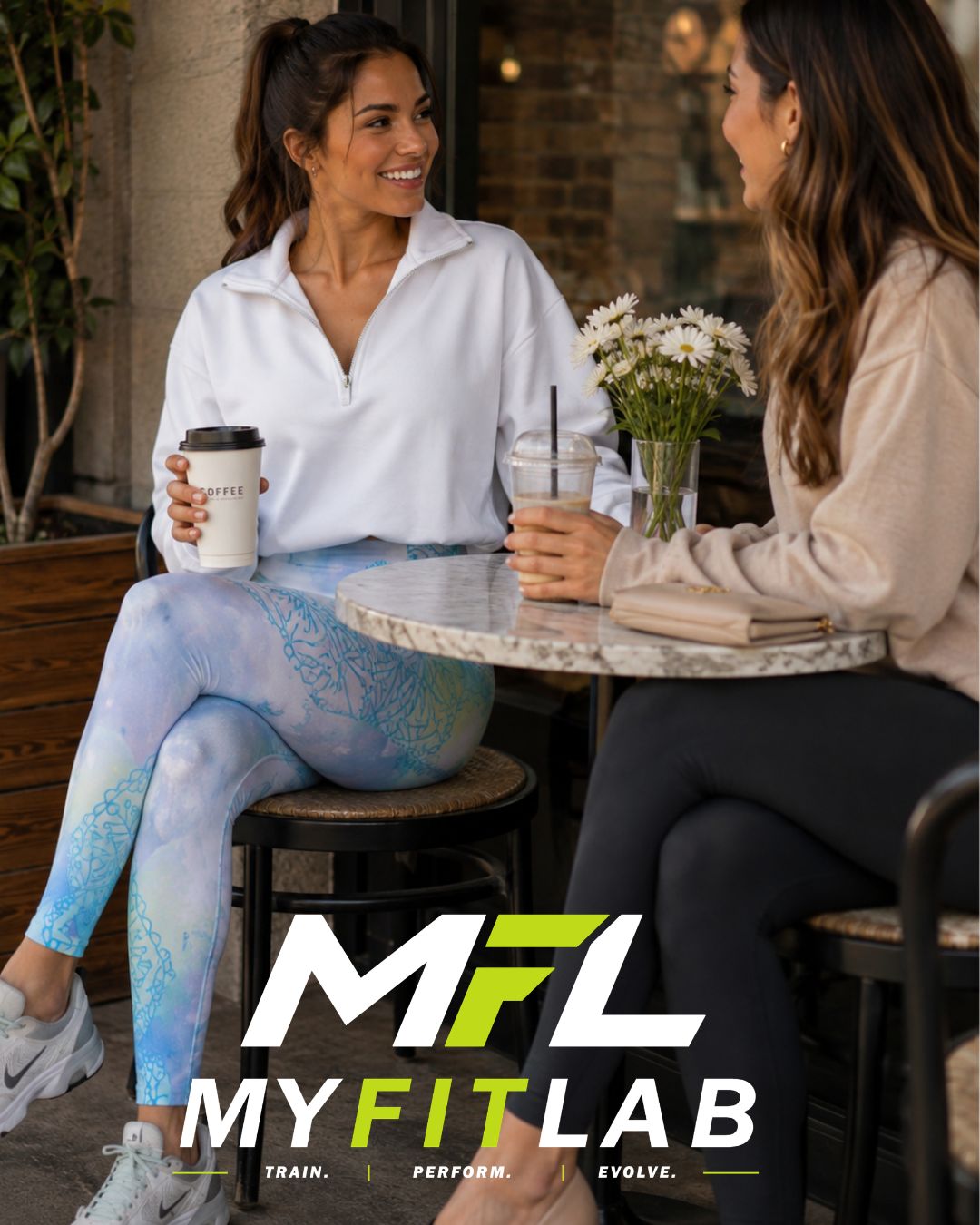 Woman styling MyFitLab Arctic Serenity leggings for a casual daytime look