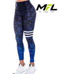 Woman wearing Blue Venom Leggings  posing sideways 