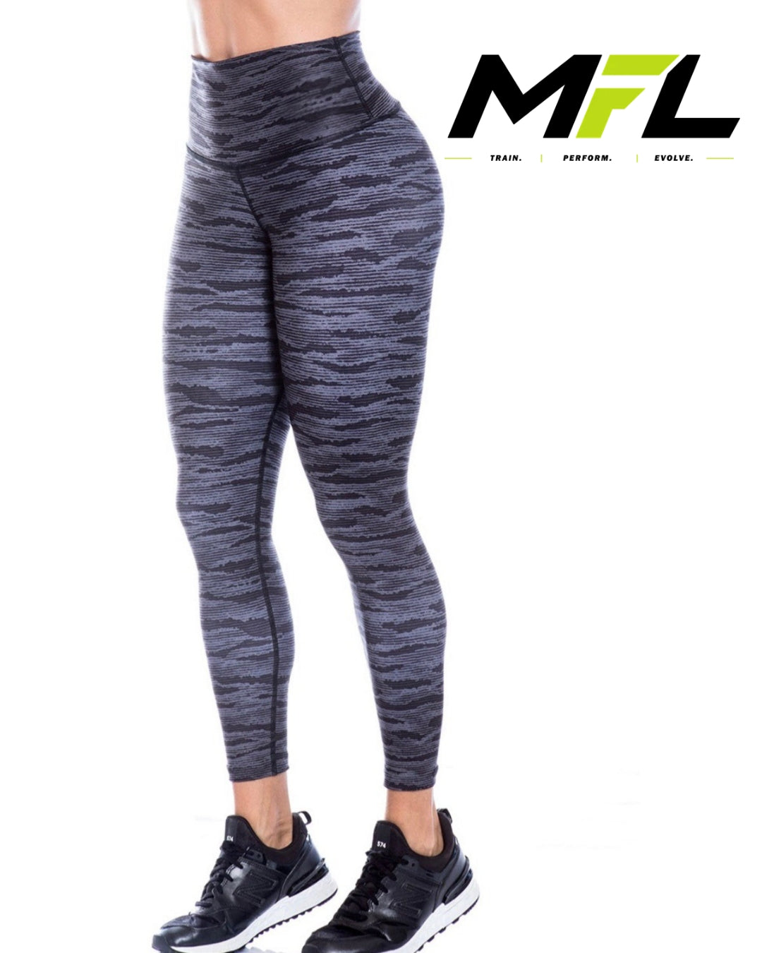 Woman wearing Carbon Core Leggings posing sideways 
