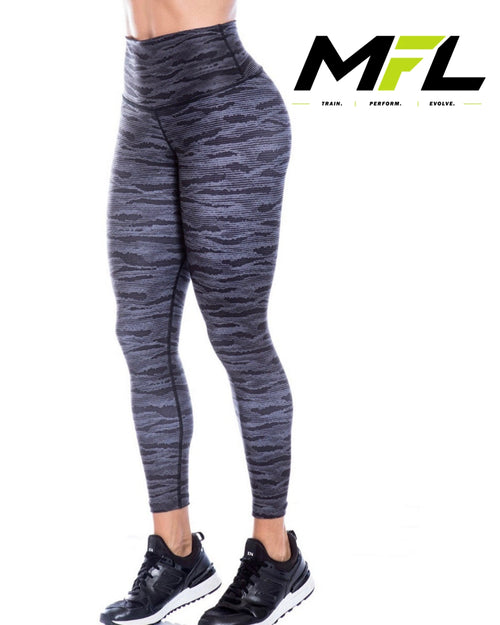 Woman wearing Carbon Core Leggings posing sideways 
