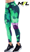 Woman wearing Emerald Pulse Leggings while posing sideways 