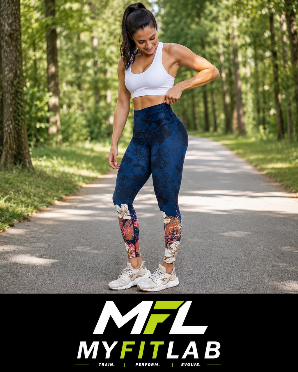 Woman wearing Moonlight Garden Leggings with big flowers abstracts at the bottom while going for a walk on the trail