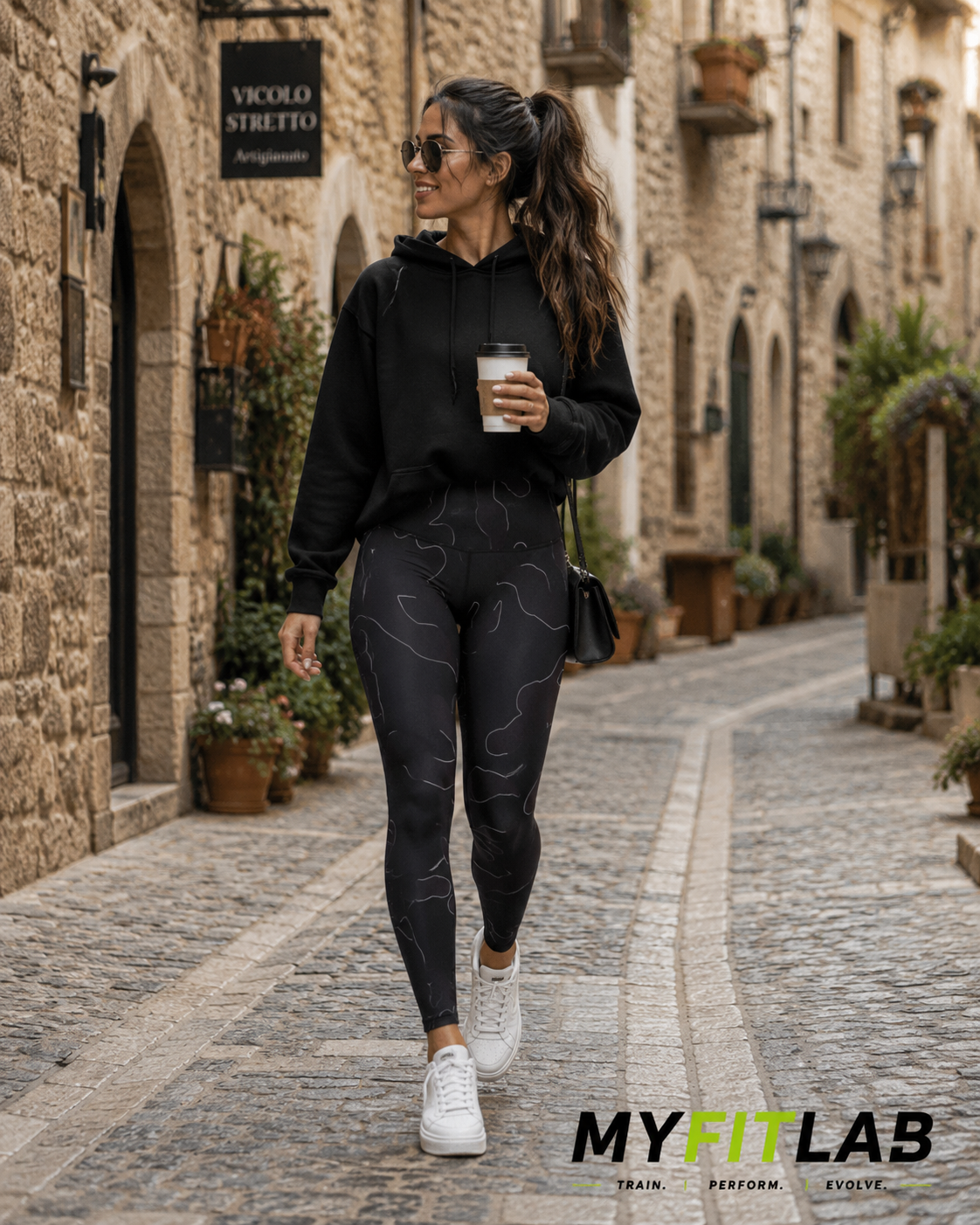 Woman wearing Phantom Camo Leggings while walking through an old town