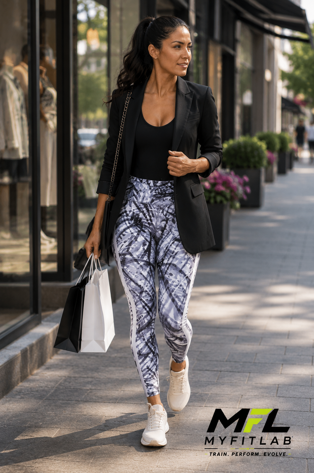 Woman wearing Silver Streak Leggings while walking through the town