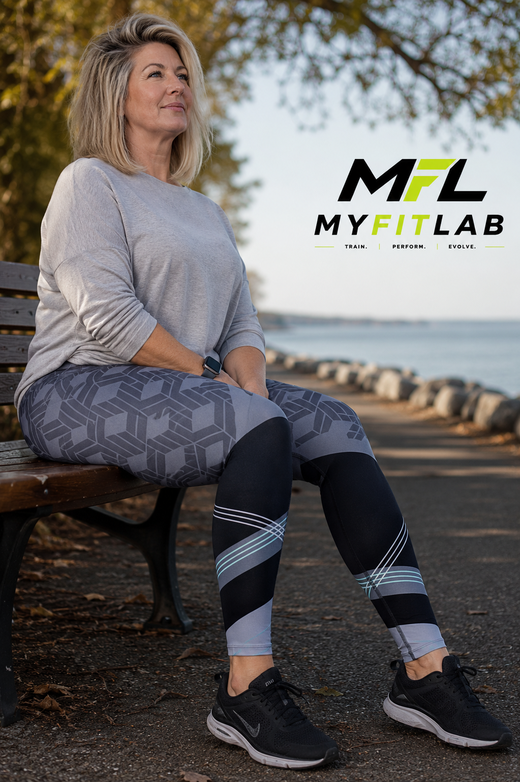 Woman sitting on a park bench wearing MyFitLab Urban Velocity Leggings high-waisted patterned leggings