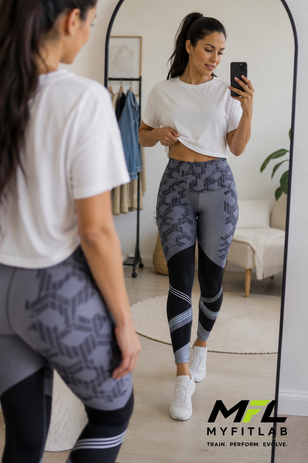 Woman looking at her self in the mirror wearing Urban Velocity Leggings 